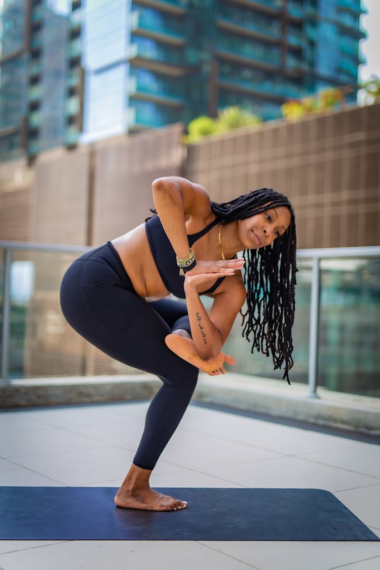 Woman Practising Yoga 