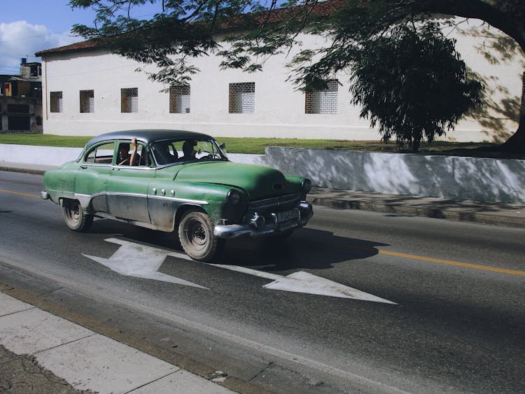 Green Classic Car O The Road