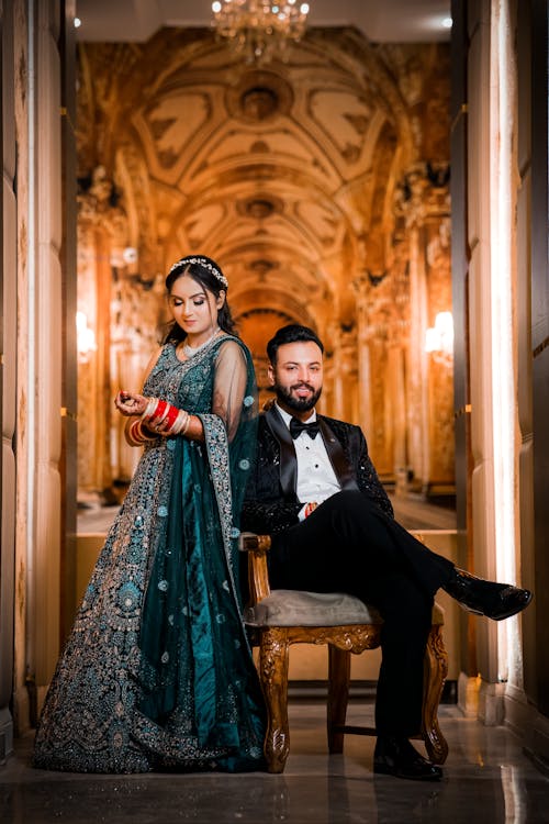 Man and Woman Posing on Wedding Photo