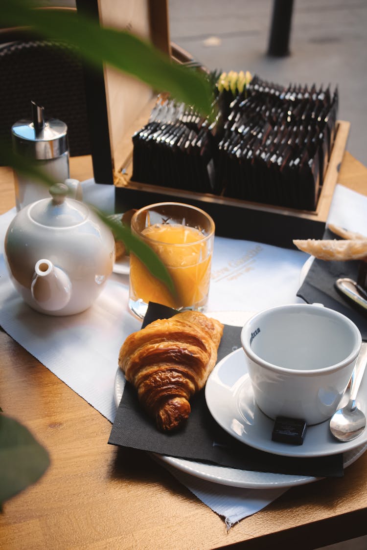 Breakfast Of Coffee Ad Croissant With Glass Of Juice