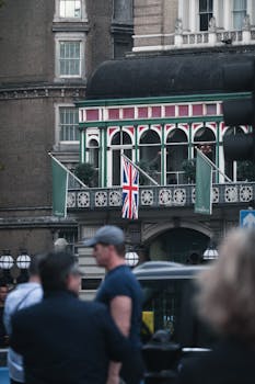 Urban scene capturing the classic architecture and Union Jack flag in London.