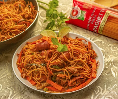 Spaghetti Dish on White Ceramic Plate