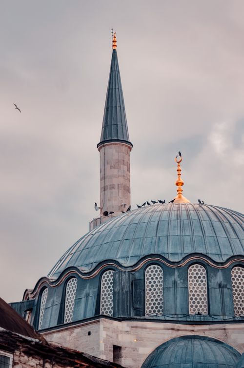 Free Stunning view of a mosque's dome and minaret in Fatih, İstanbul, showcasing Islamic architecture. Stock Photo