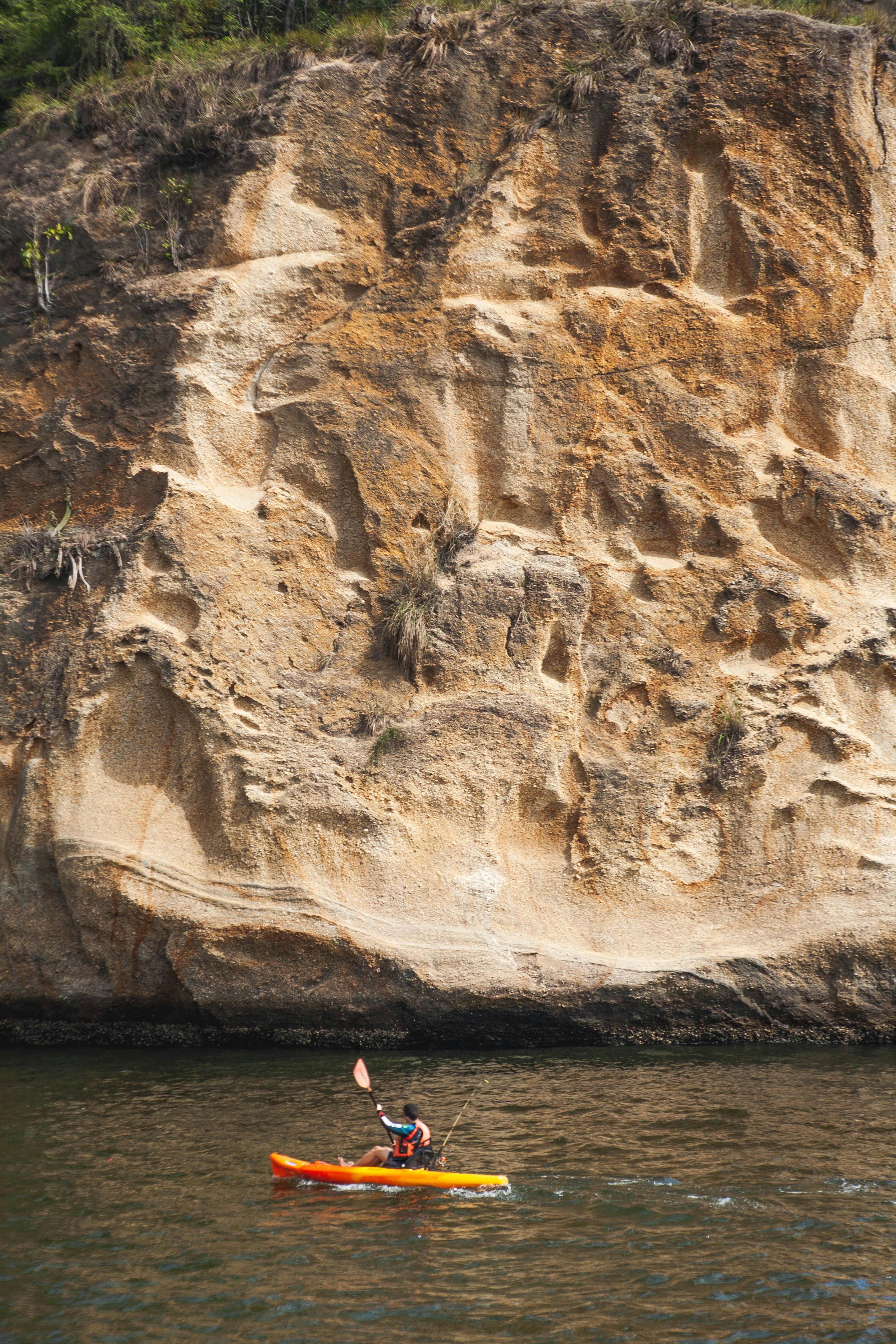 A Person Paddling a Canoe · Free Stock Photo