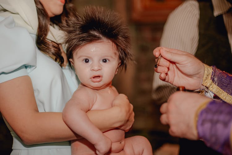 Baby During Religious Ceremony