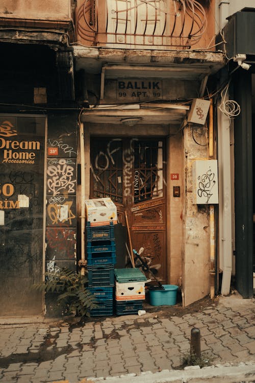 Trash in Front of an Abandoned Apartment Doorway