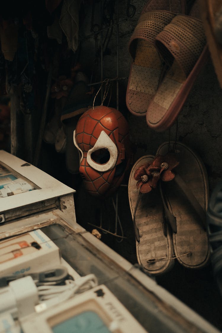 Spiderman Mask Near Flip Flops