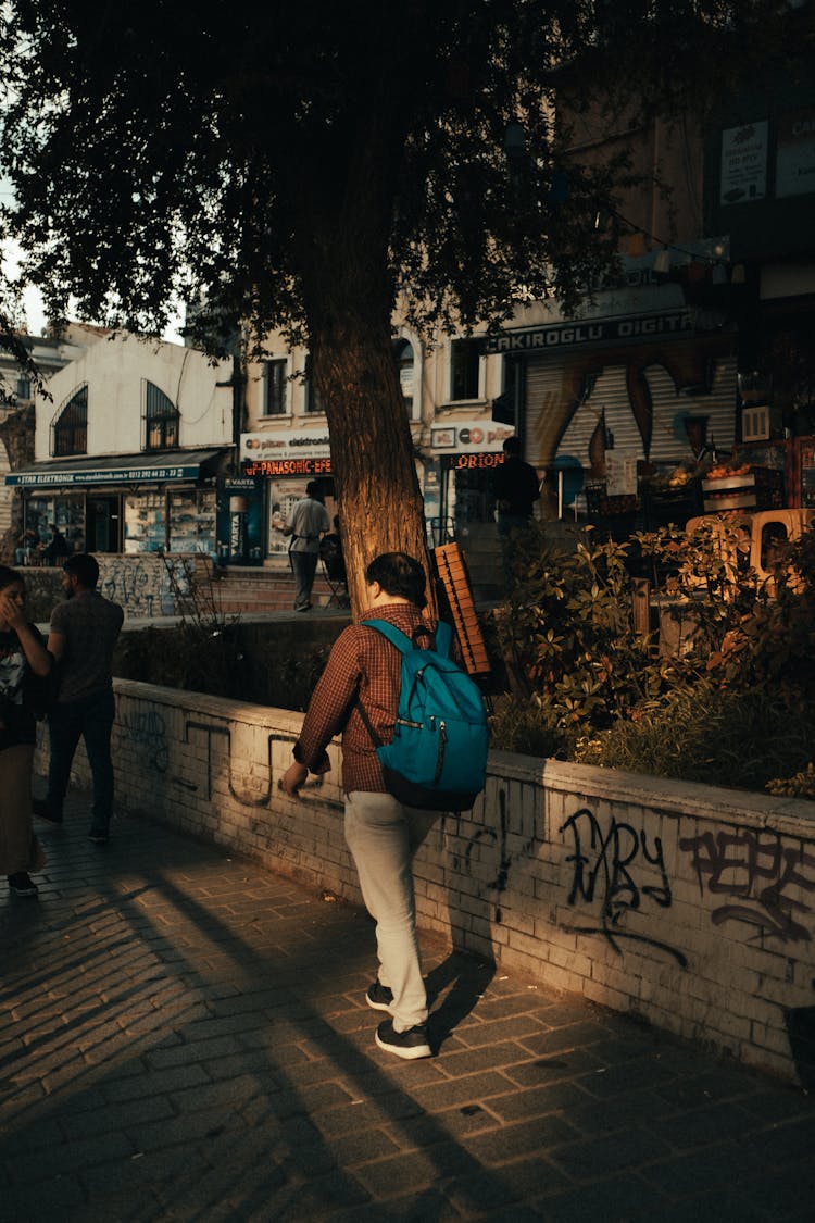 Man Walking In Town