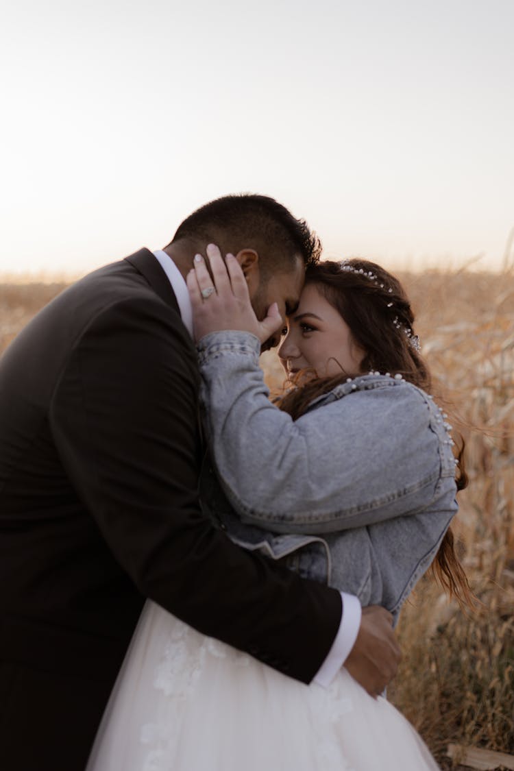 A Woman And Man Looking At Each Other 