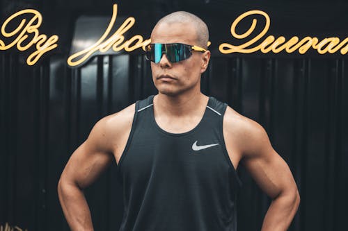 Man in Tank Top and Sunglasses
