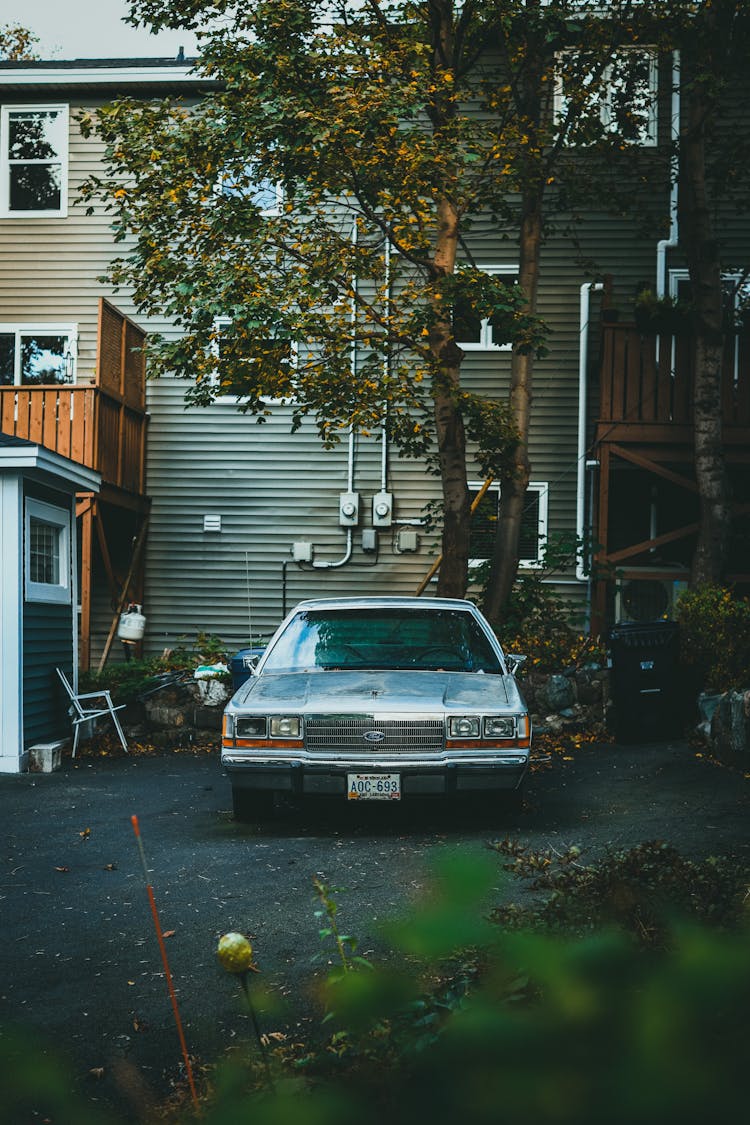 Old Car Parking On The Yard