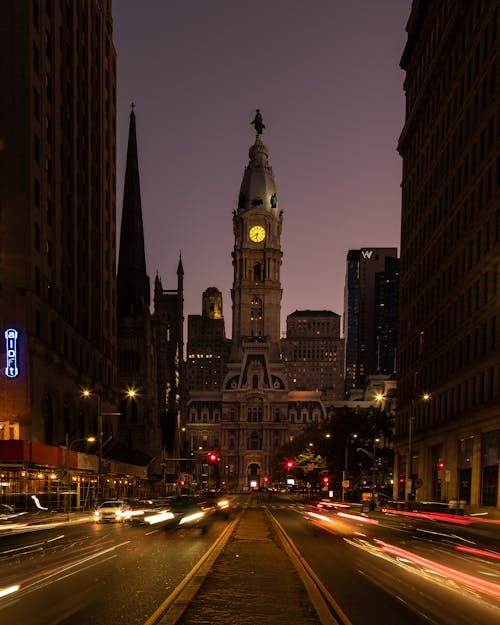 Cars on Roads near High-rise Buildings during Night Time