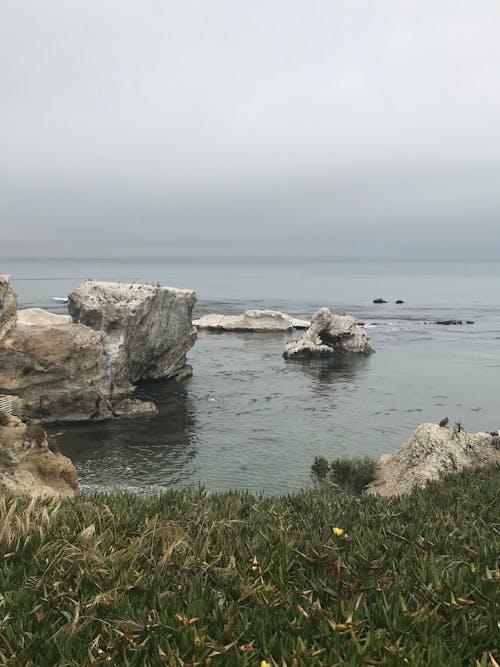 Photo of Rock Formations on Sea