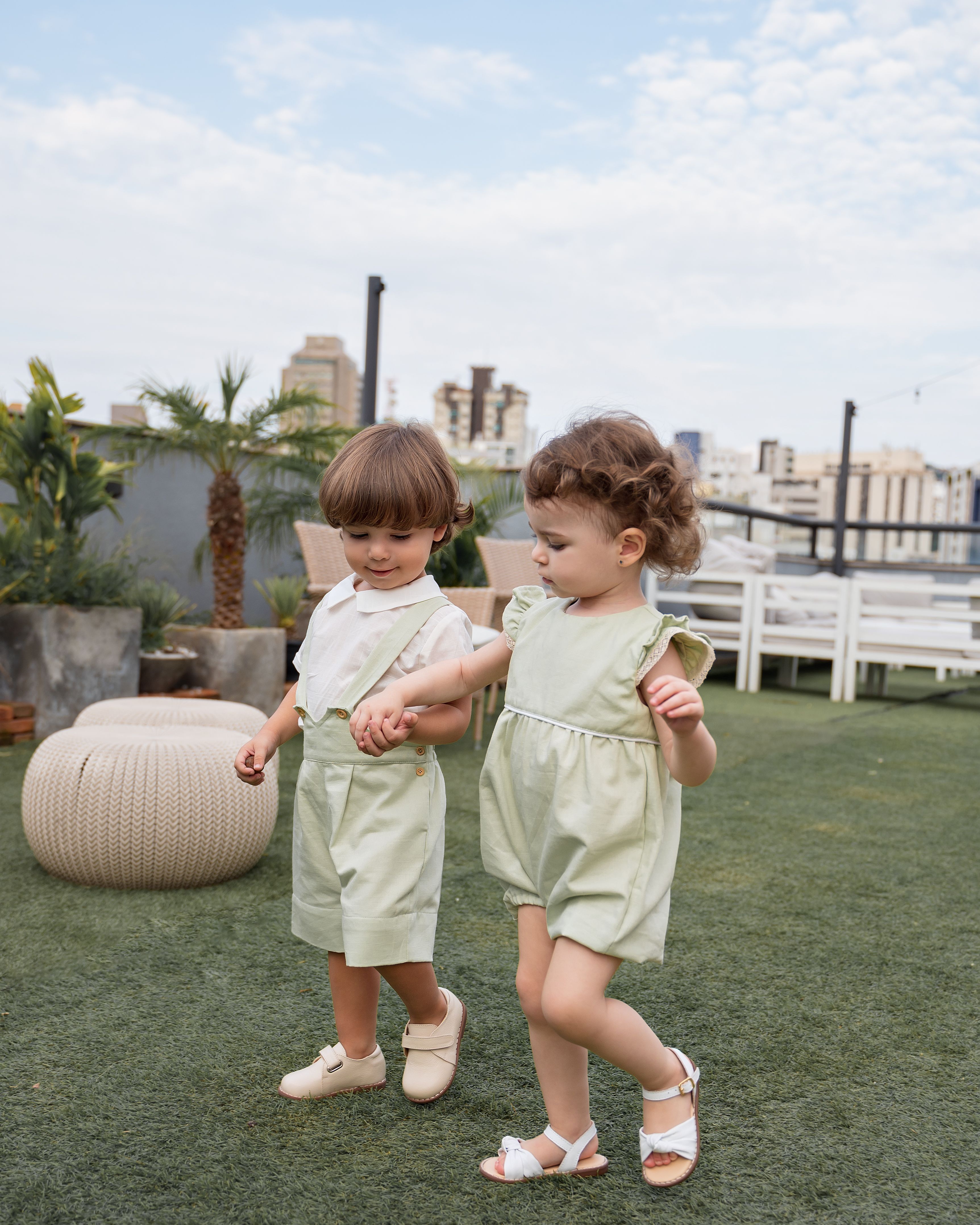 A Young Boy and a Young Girl Holding their Hands · Free Stock Photo