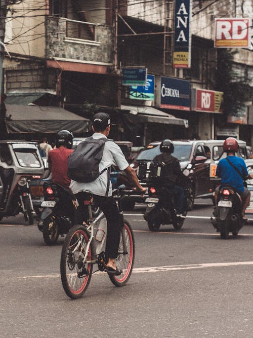 Fotos de stock gratuitas de bicicleta, carretera, de espaldas