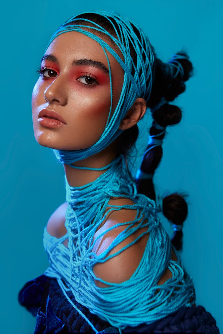 Woman Wrapped In Blue Yarn 