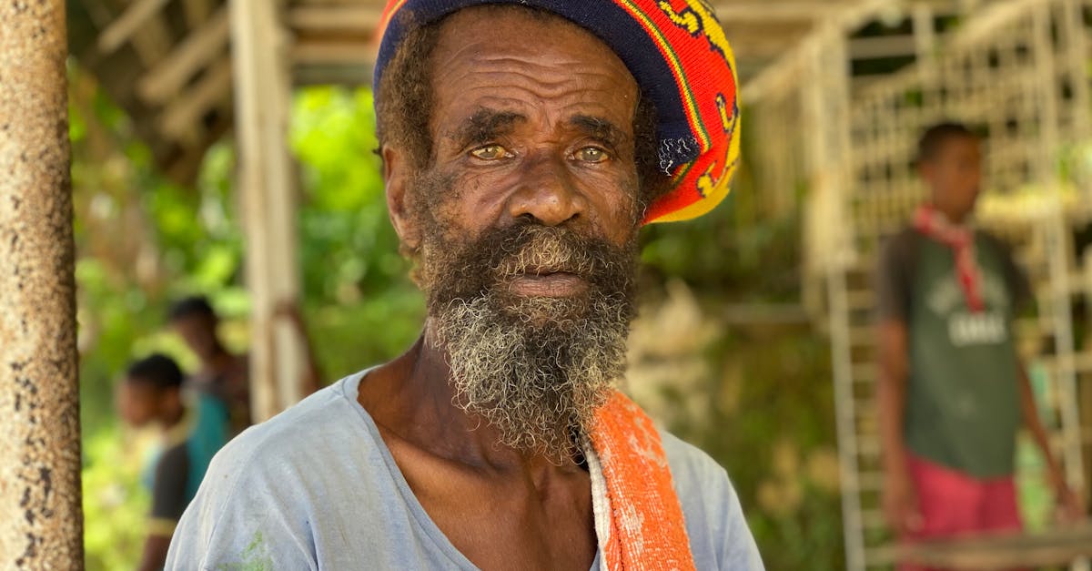 Elderly Rasta Man with Facial Hair Wearing a Rasta Tam Hat · Free Stock ...