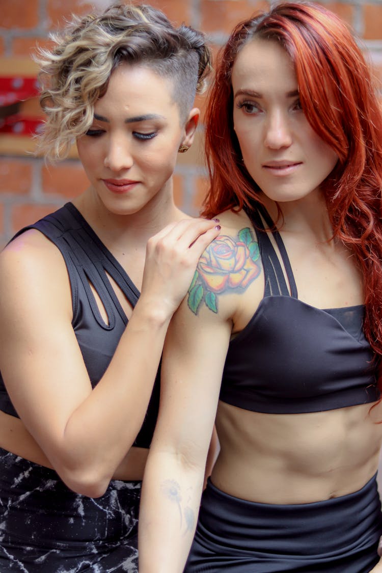 Women With Dyed Hairstyle Wearing Black Sports Bras