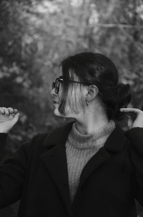 Black and White Photo of Woman Looking Sideways