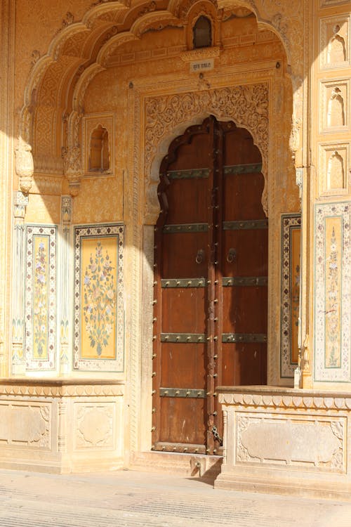 Ornamented Wall around Wooden Door