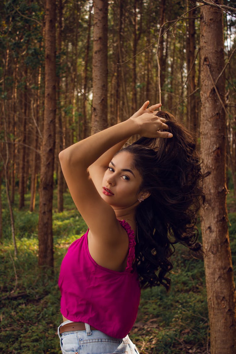 Young Woman Posing In A Forest 