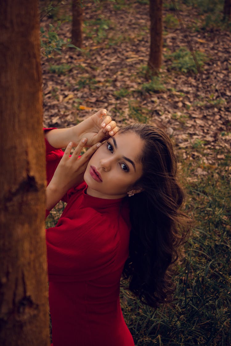 Young Woman Posing In A Forest 