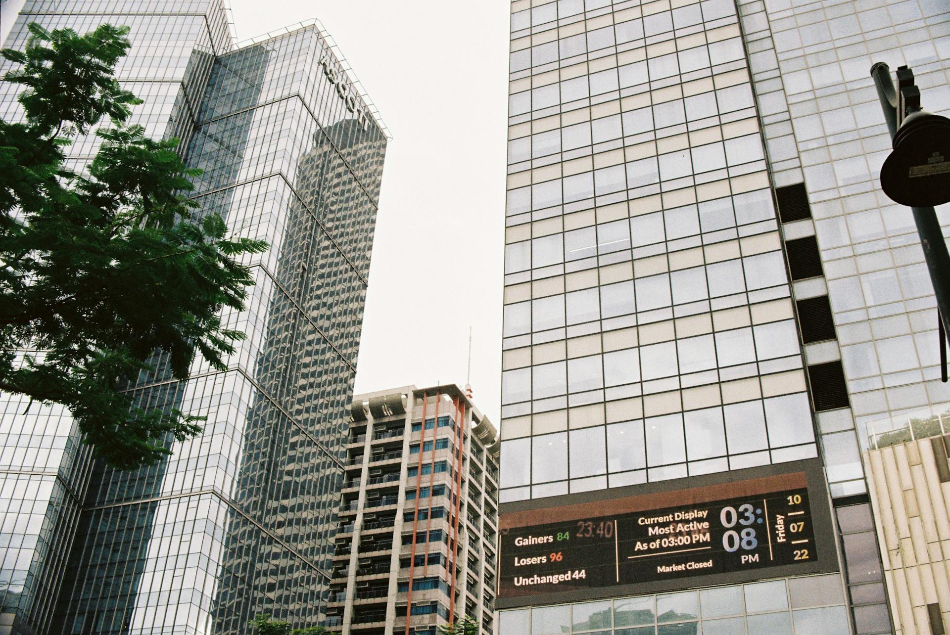 Low Angle Shot of Glass Facade Buildings