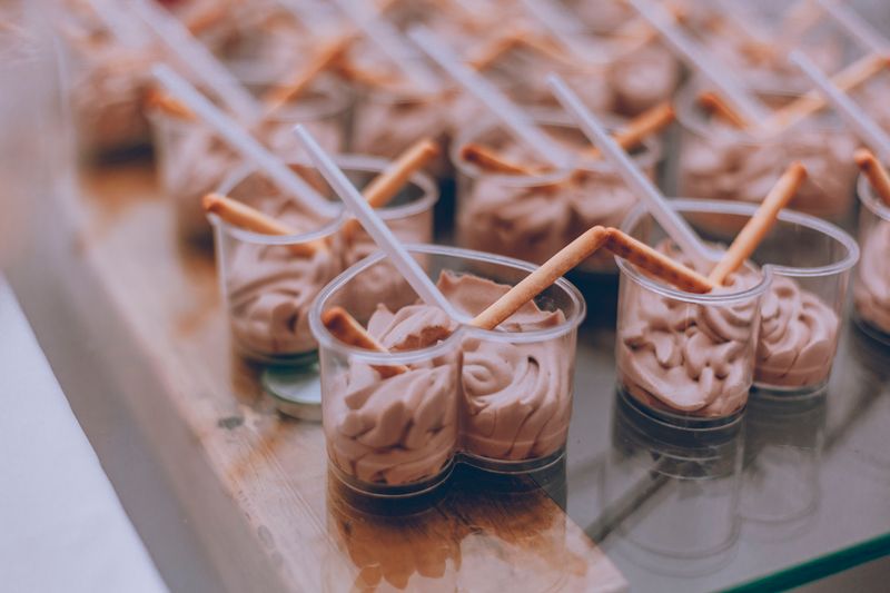 layered trifle in small clear cups