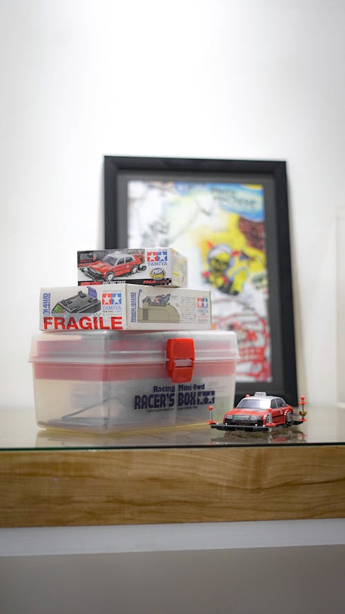 Boxes with Toy Race Cars 