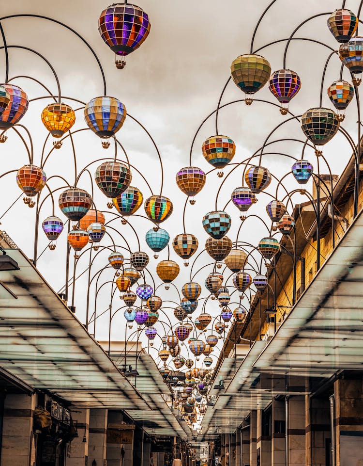 Hot Air Balloons Shaped Lamps In City Passage