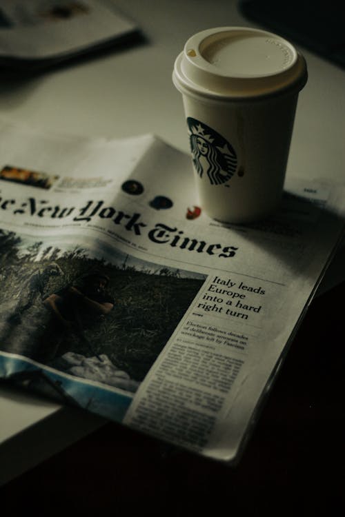 Takeaway Cup and a Newspaper