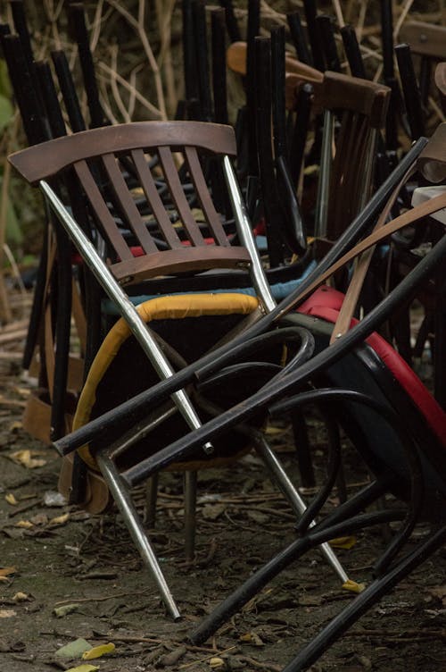 Close Up Shot of Abandoned Chairs