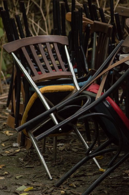 Free A collection of abandoned multi-colored chairs outdoors in Istanbul, Turkey. Stock Photo