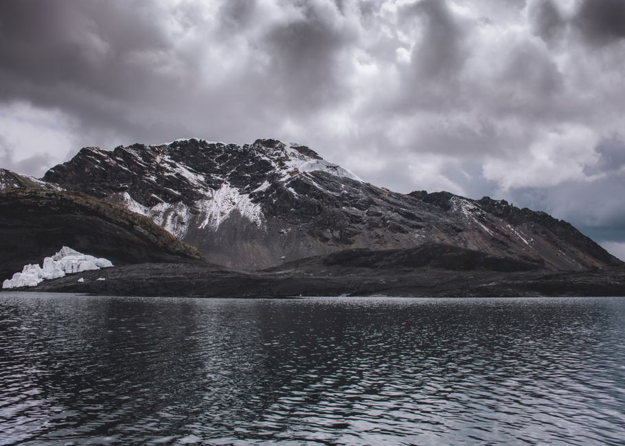 7Day-VIP Tour Climb Mount Alpamayo 5957m with Helicopter Support - Stunning view of snow-capped mountains and glacier reflections in Huaraz, Peru.