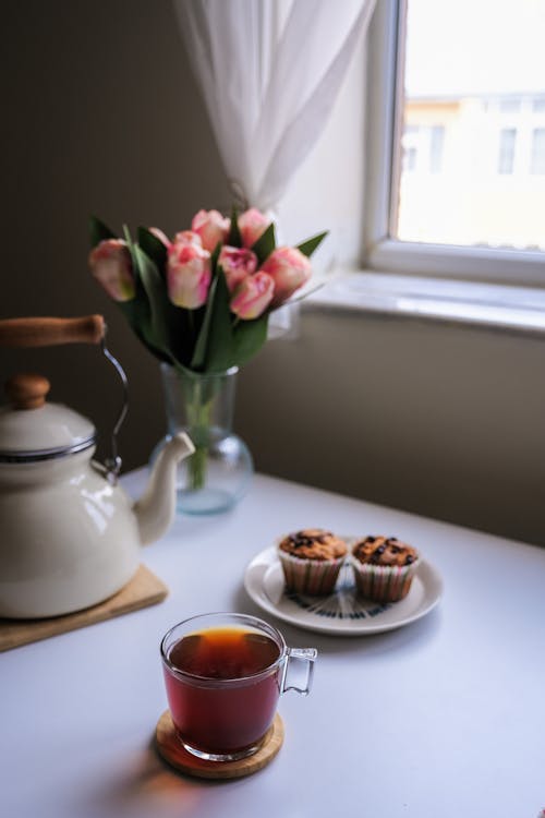 Cupcakes Beside White Ceramic Teapot