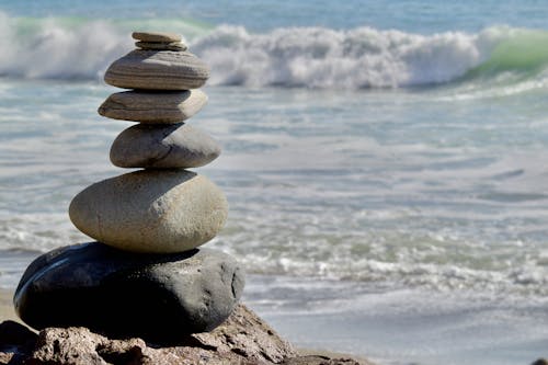 Stack of Stones on Sea Beach