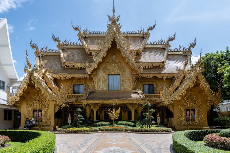 Facade Of Golden Restroom Building Wat Rong Khun In Chiang Rai, Thailand