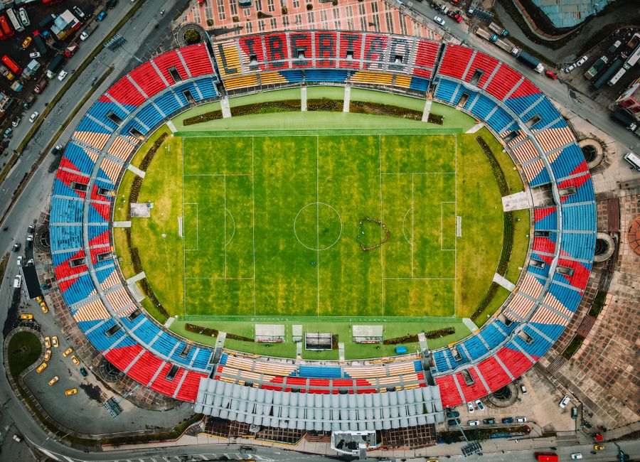 Aerial photograph capturing Estadio Departamental Libertad in Pasto, Colombia.