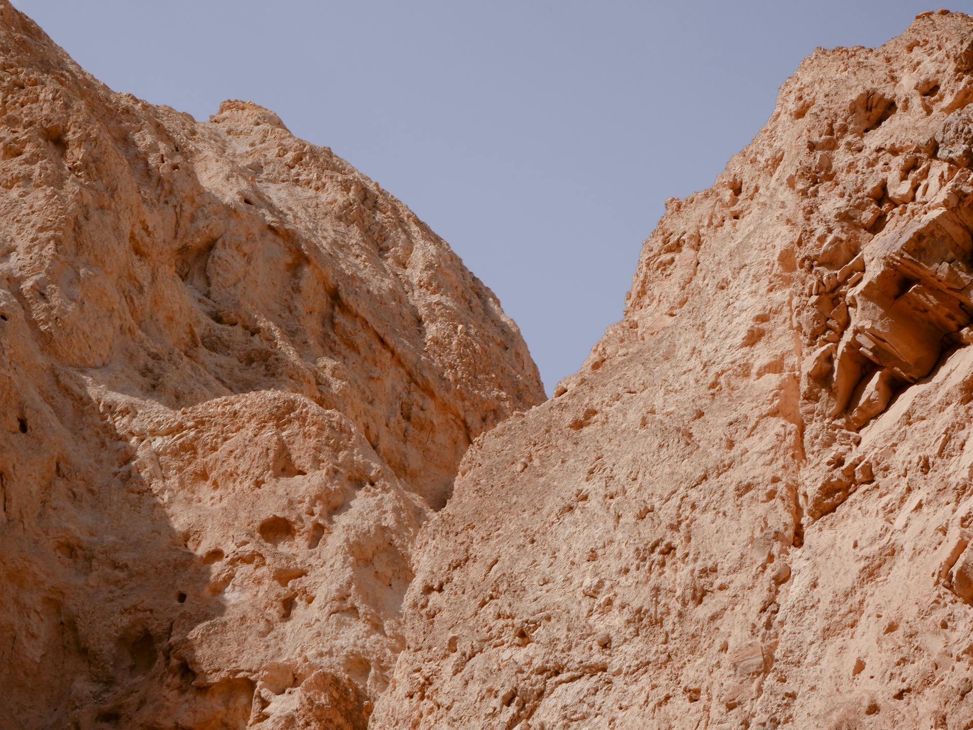 Explore the stunning rugged landscapes and geological formations of Ein Gedi, Israel.