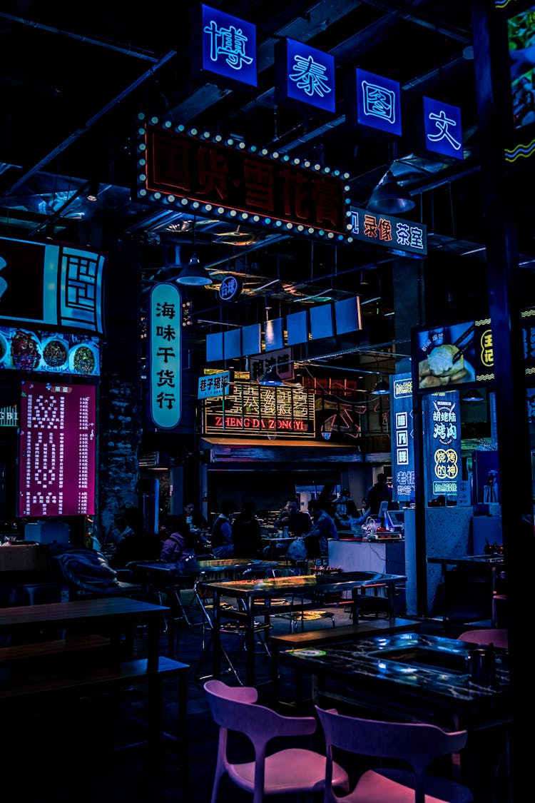 Neon Signs In Dark Bar