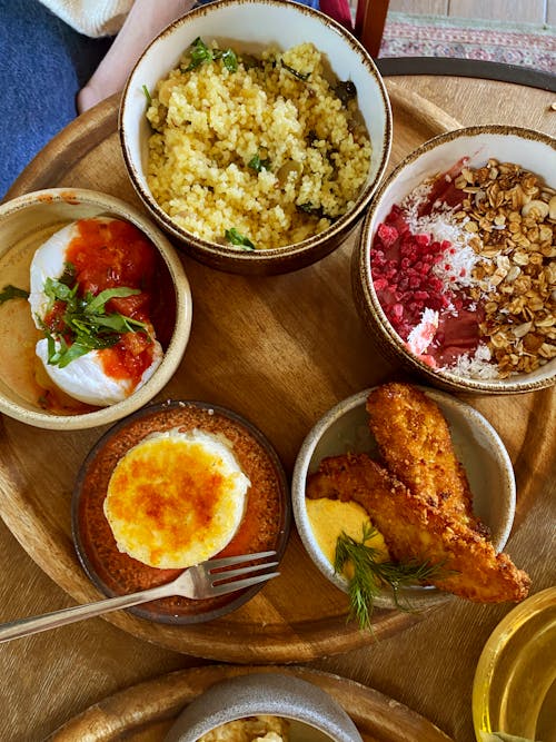 Brunch table setting with different delicious food indoors, top view