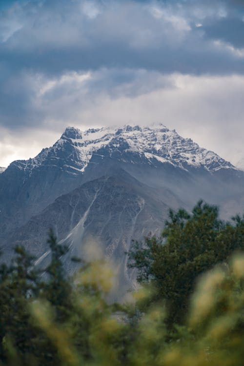 Free Snowcapped Mountain under an Overcast Sky  Stock Photo