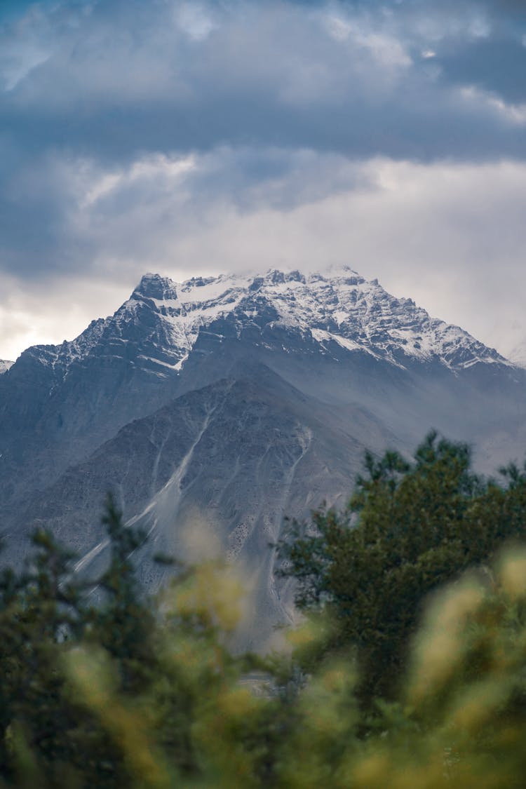 Snowcapped Mountain Under An Overcast Sky 