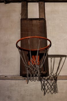 Vintage basketball hoop casting a shadow on a wall in Istanbul, Turkey.