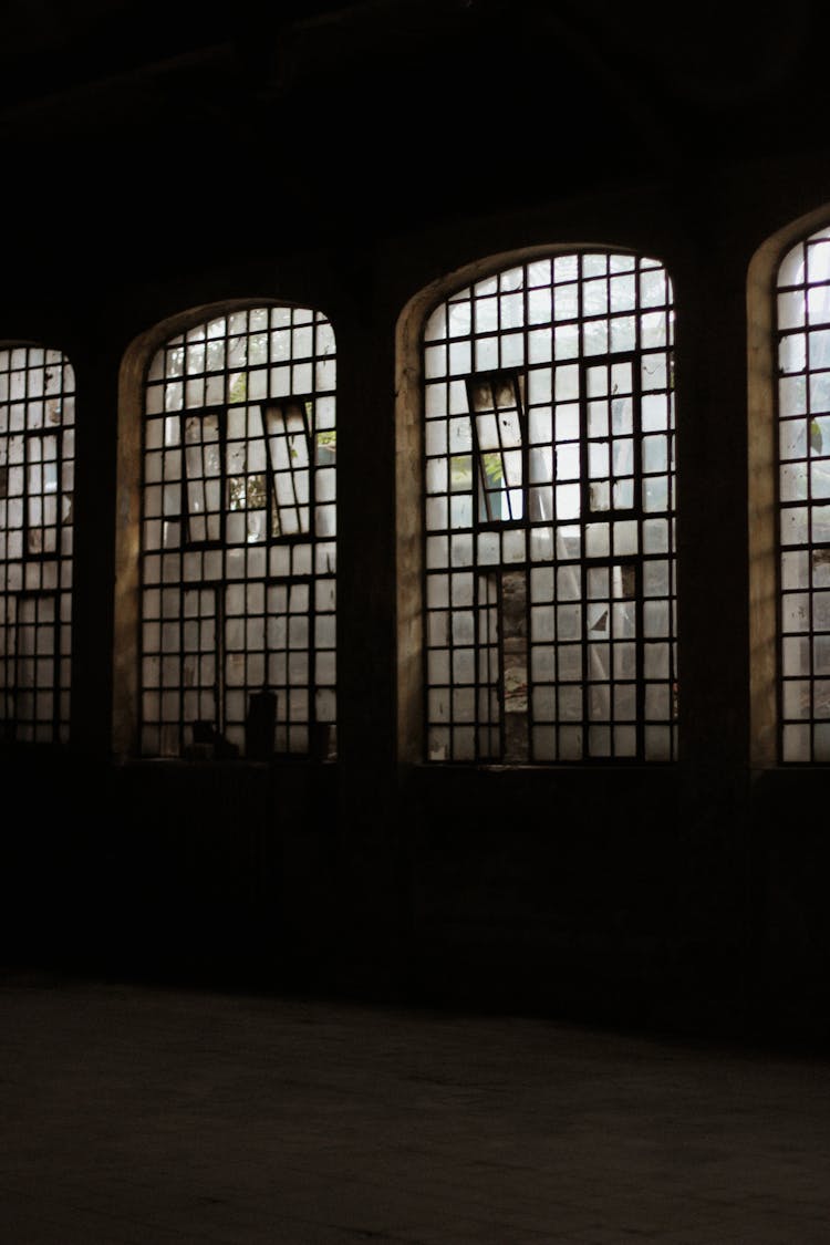 Old Broken Windows Of A Building