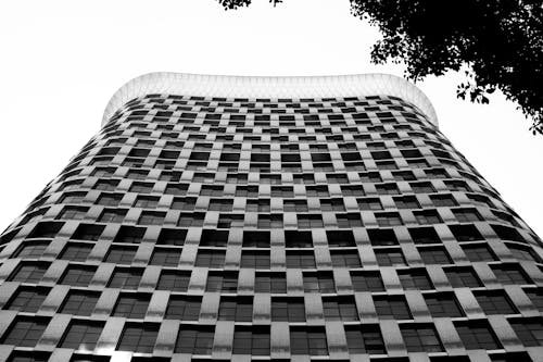 White and Black Concrete Building in Low Angle Photography