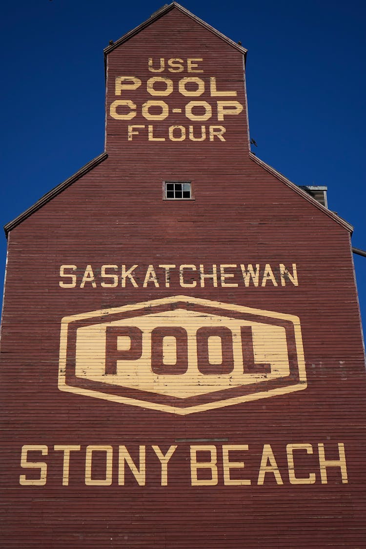 Saskatchewan Old Grain Elevator Under Blue Sky