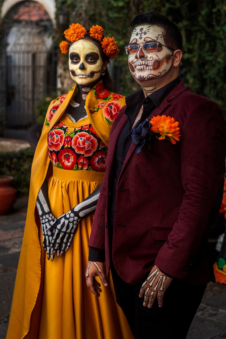 Woman And Man In Catrina Costumes