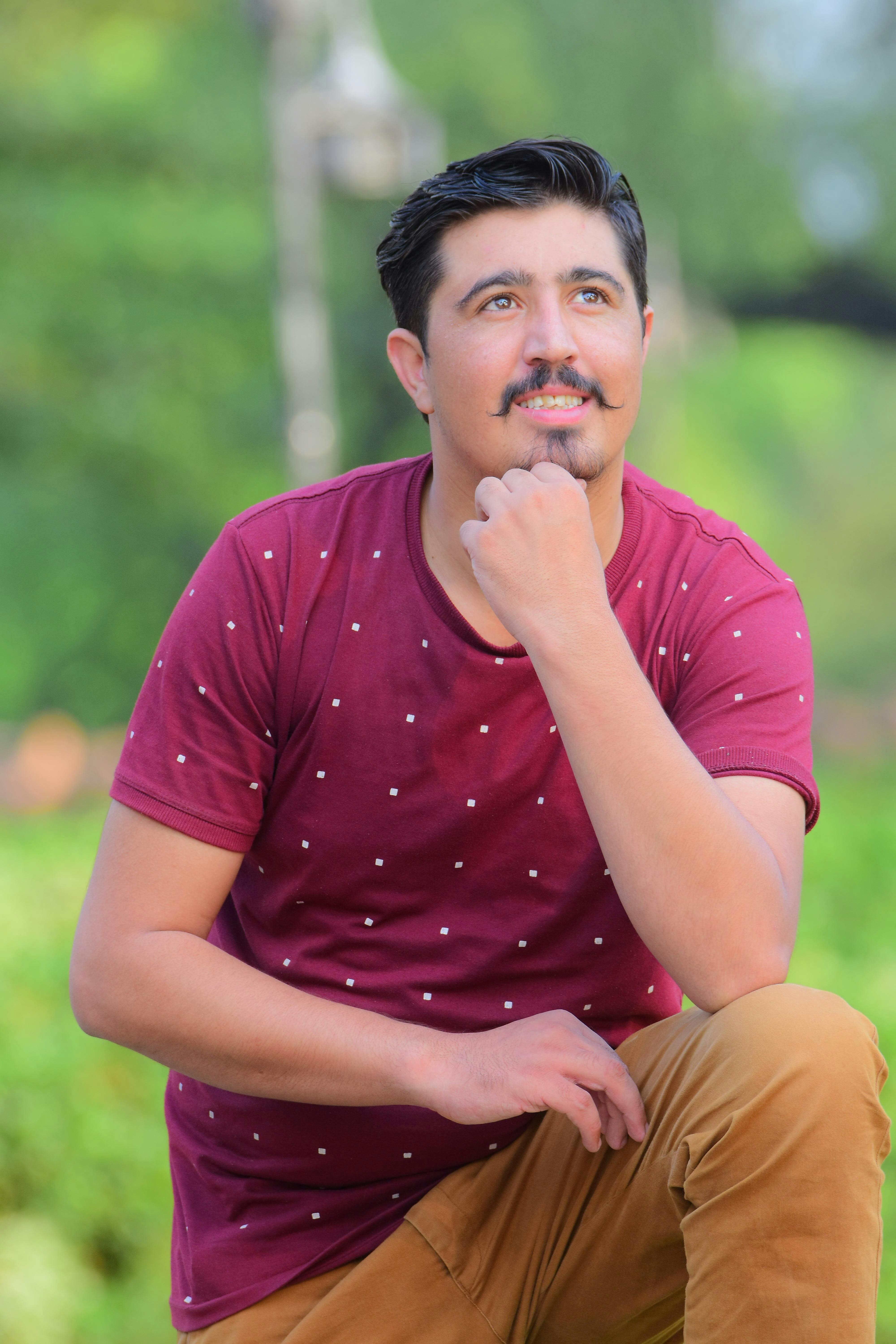 A Man Posing with Mustache · Free Stock Photo