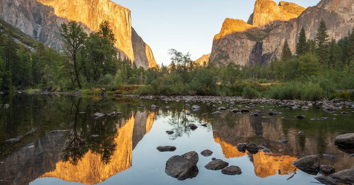 The Brown Rocks Brown Rock Formation Beside Body of Water · Free Stock Photo